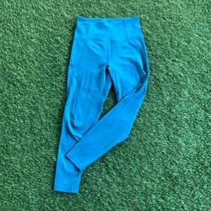 SM Blue Girlfriend Collective Compressive Leggings.